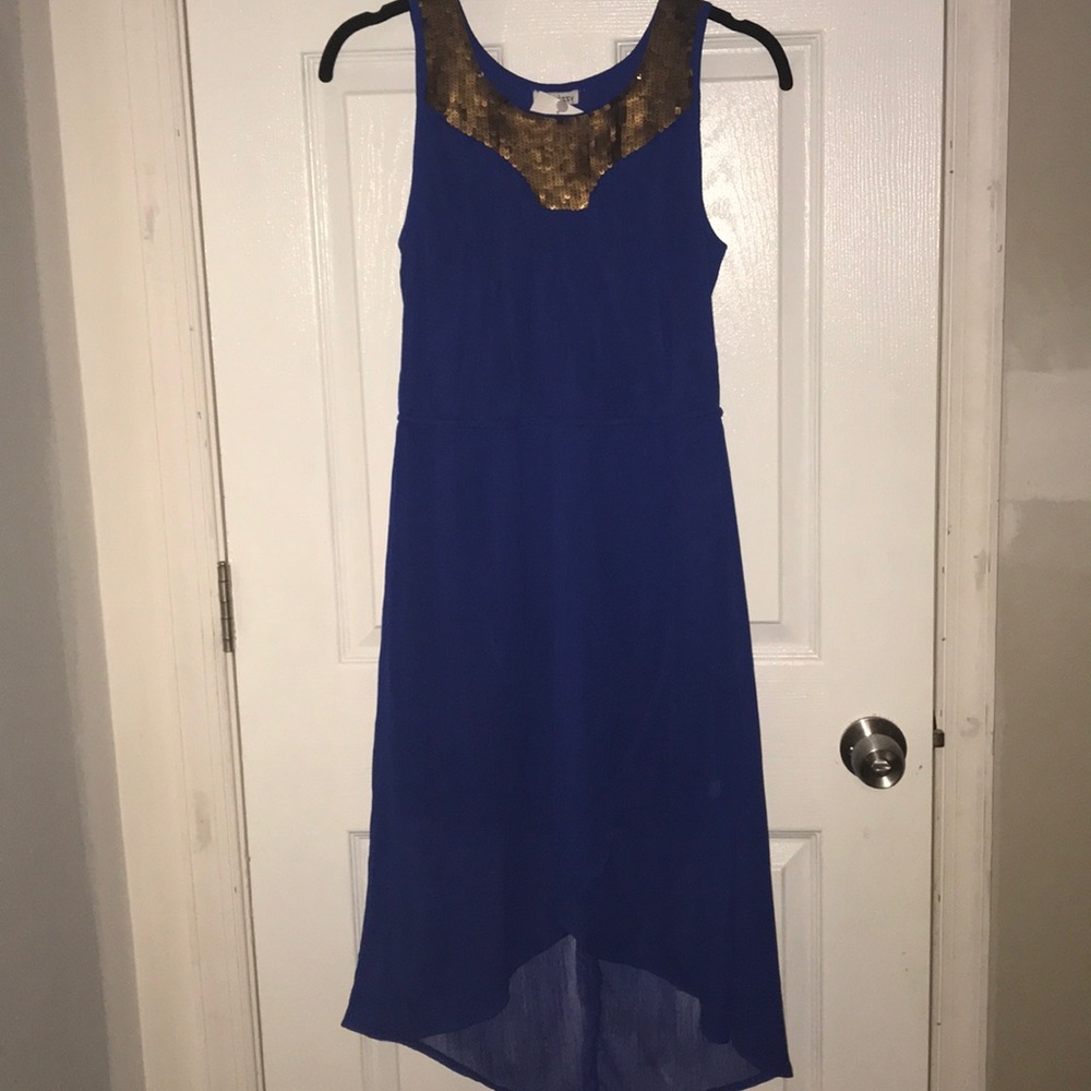 Blue flowy dress with bronze sequence necklane